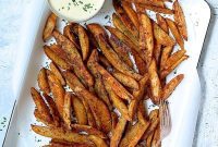 Crunchy Old Bay Wedges, Smothered in Vermont Cheddar