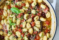 Zesty Cherry Tomato Puttanesca with Pillowy Gnocchi