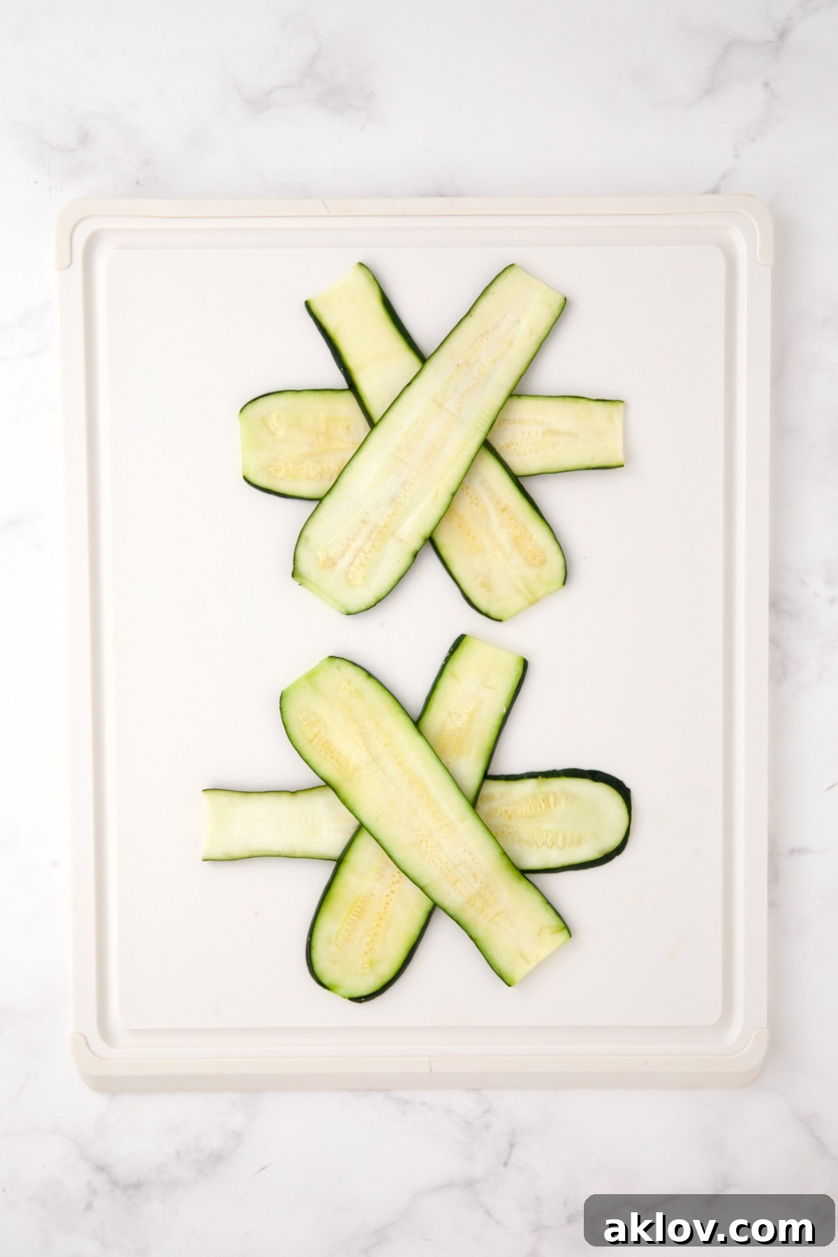 Two sets of zucchini slices in a star pattern.