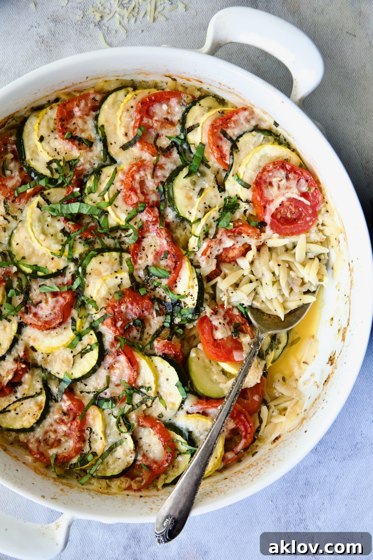The finished Orzo Vegetable Tian, showcasing its golden crust and tender vegetables, ready for serving.