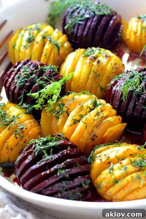 Fan-Cut Roasted Beets with Zesty Dill Dressing 8 Photo of Roasted Hasselback Beets with Dill Dressing in white serving dish garnished with fresh dill.