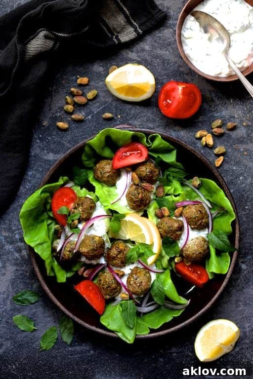 Turkish Turkey Meatball Wraps and all the accompaniments in brown ceramic bowl.