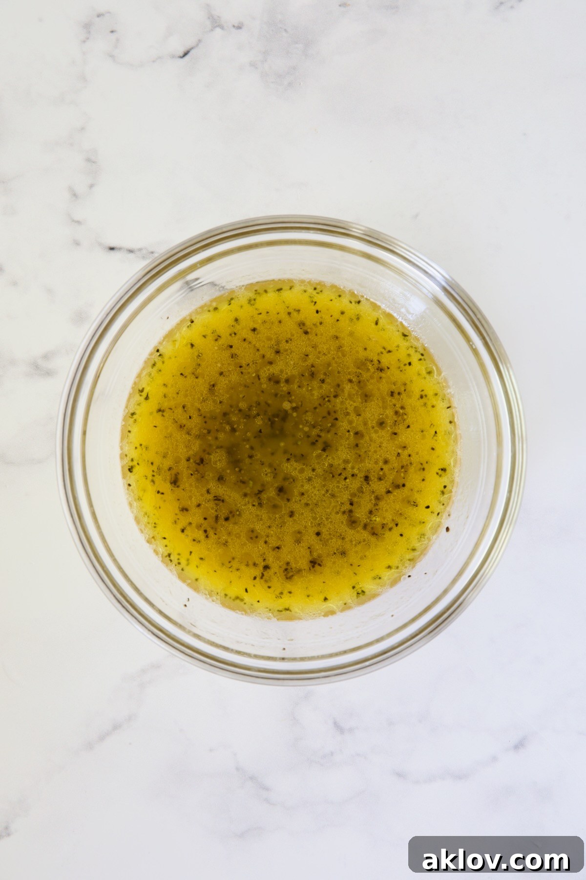 Vinaigrette in glass bowl.