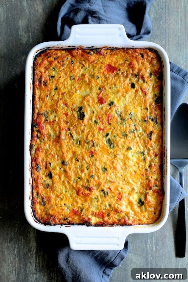 Photo of Spaghetti Squash Poblano Chorizo Breakfast Casserole on blue towel.