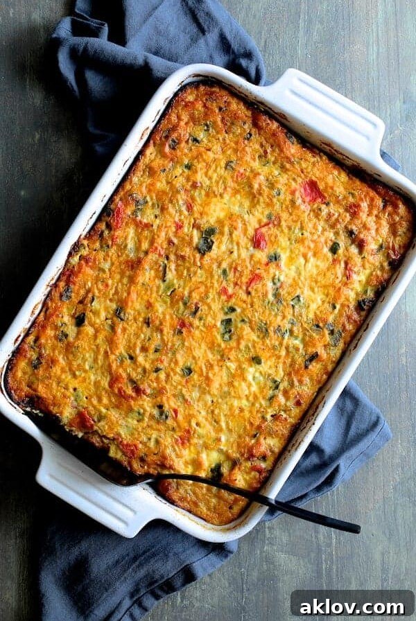 Spaghetti Squash, Poblano and Chorizo Breakfast Casserole in rectangular white baking dish after being baked and before being cut.