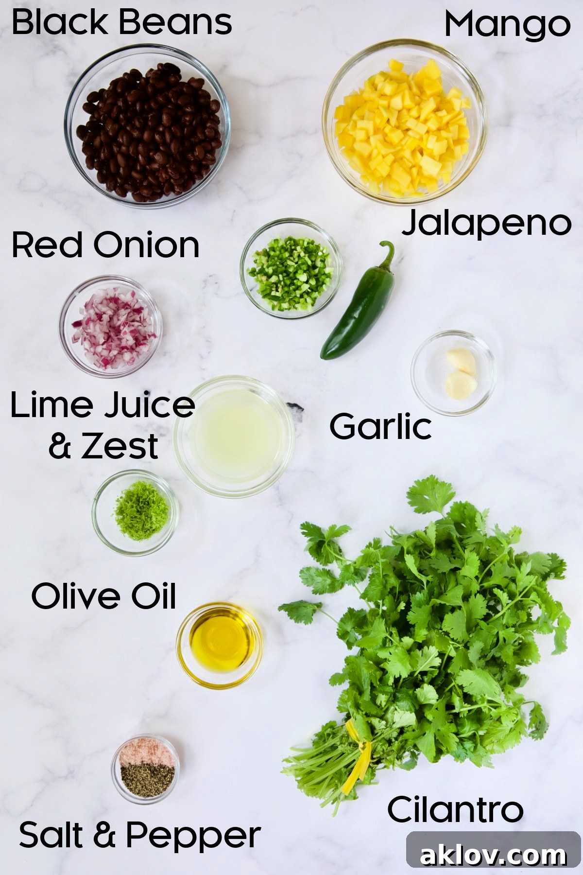 Ingredients for Mango Black Bean Salsa in glass bowls.