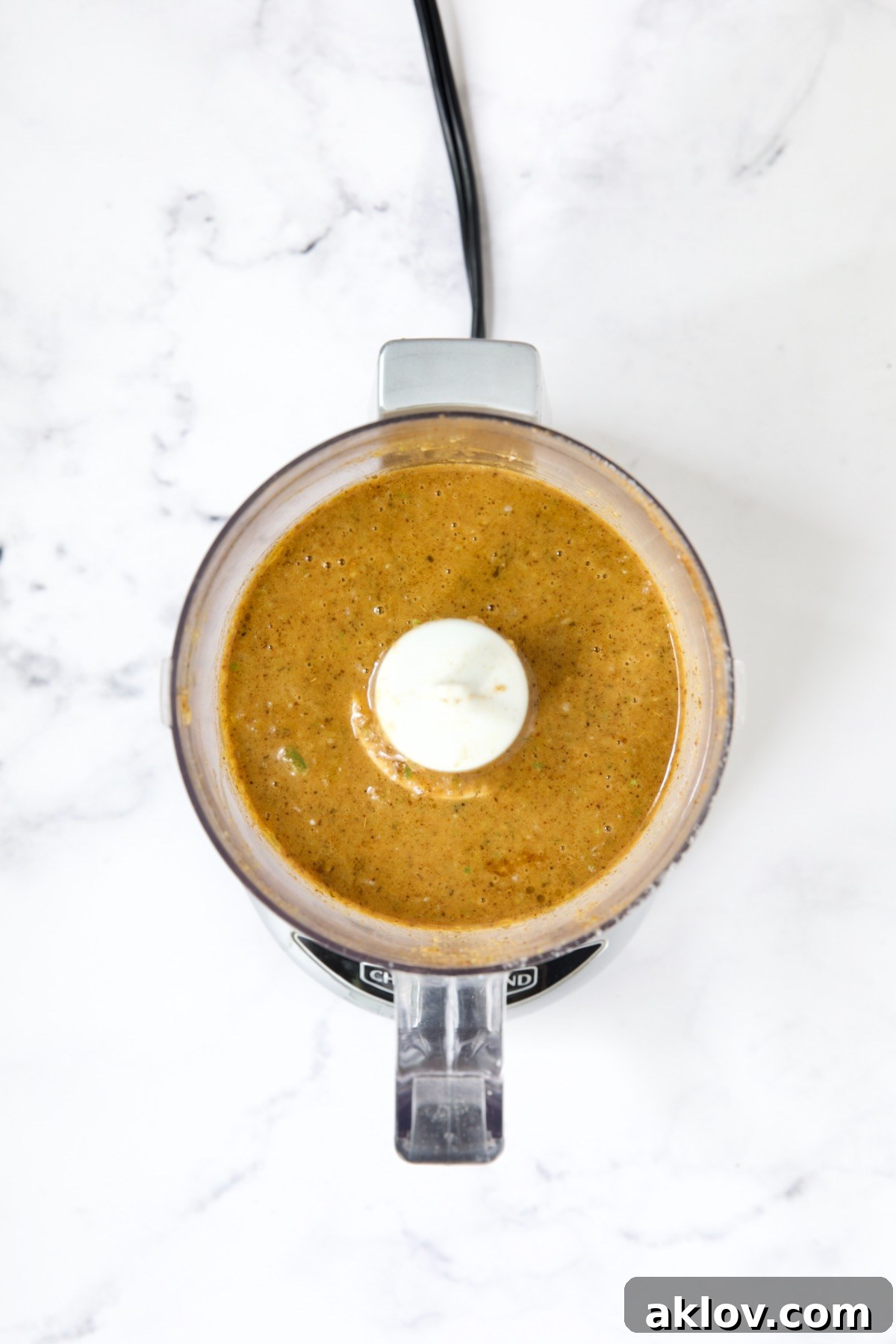 Pureed marinade in mini food processor.