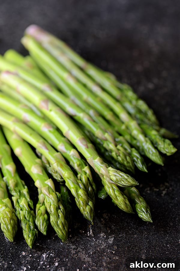 Photo of fresh uncooked fresh asparagus.