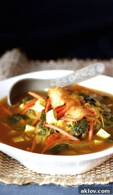 Asian Vegetable Soup in white soup bowl.