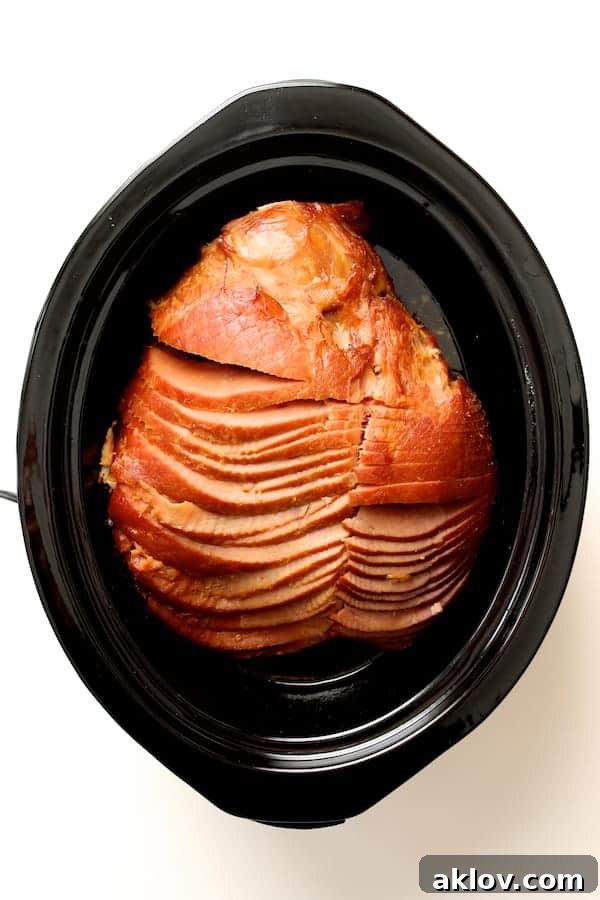 Photo of spiral sliced ham in slow cooker.