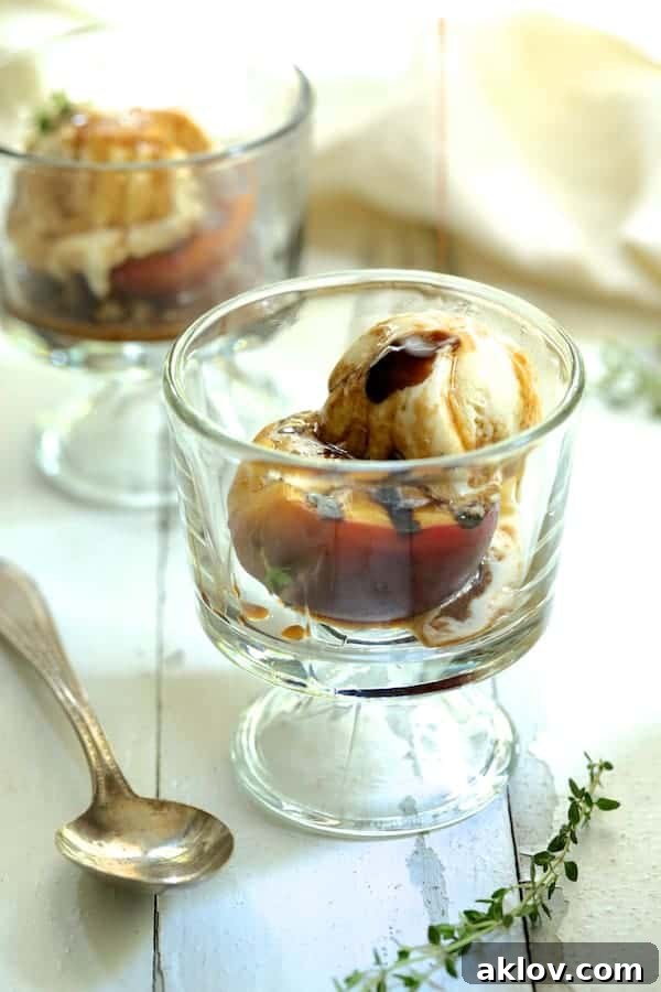 Photo of Grilled Peaches with Vanilla Ice Cream being drizzled with Honey - Balsamic Drizzle.