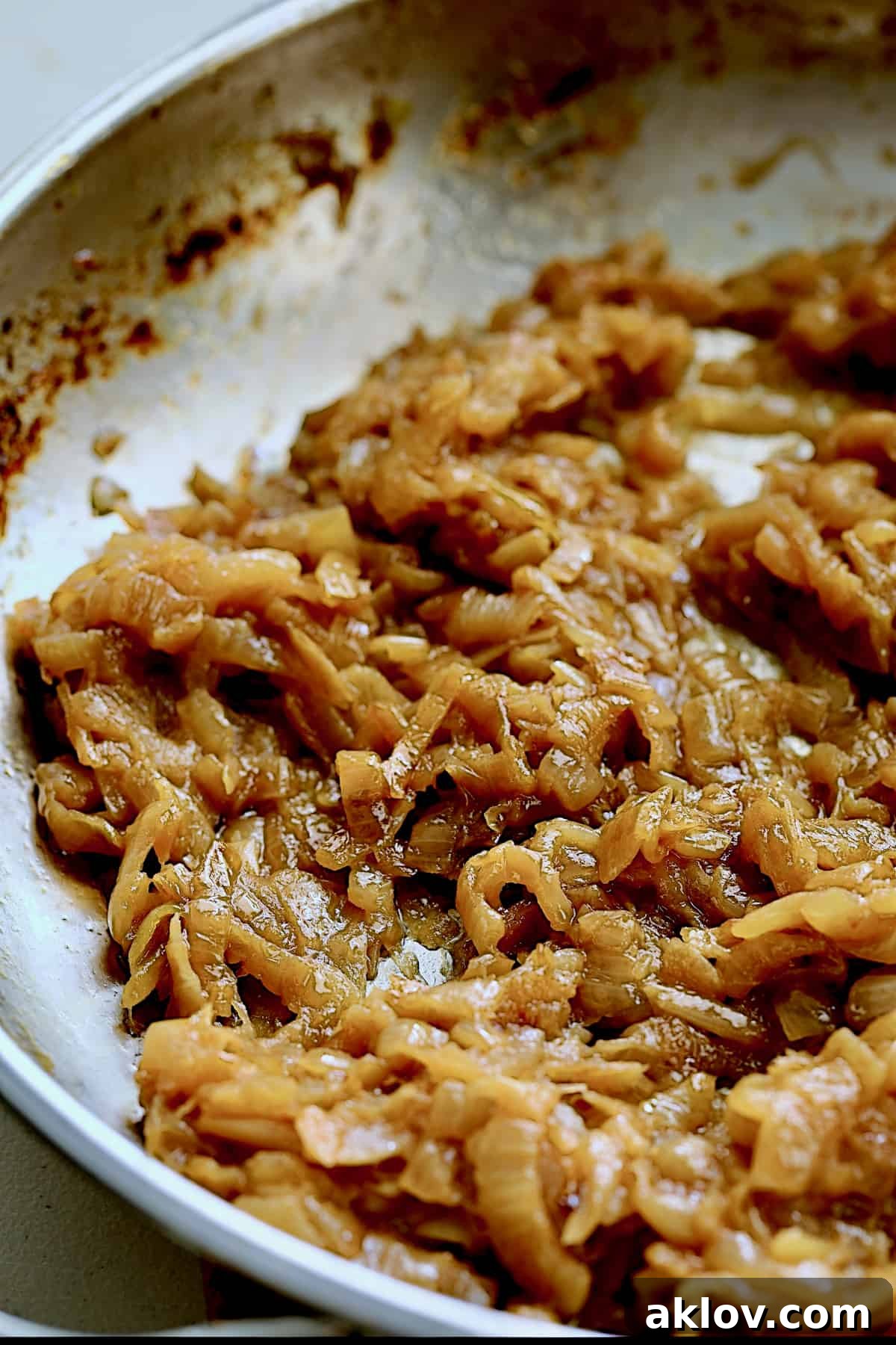 Date Night French Onion Indulgence 8 Caramelized onions in stainless steel skillet.