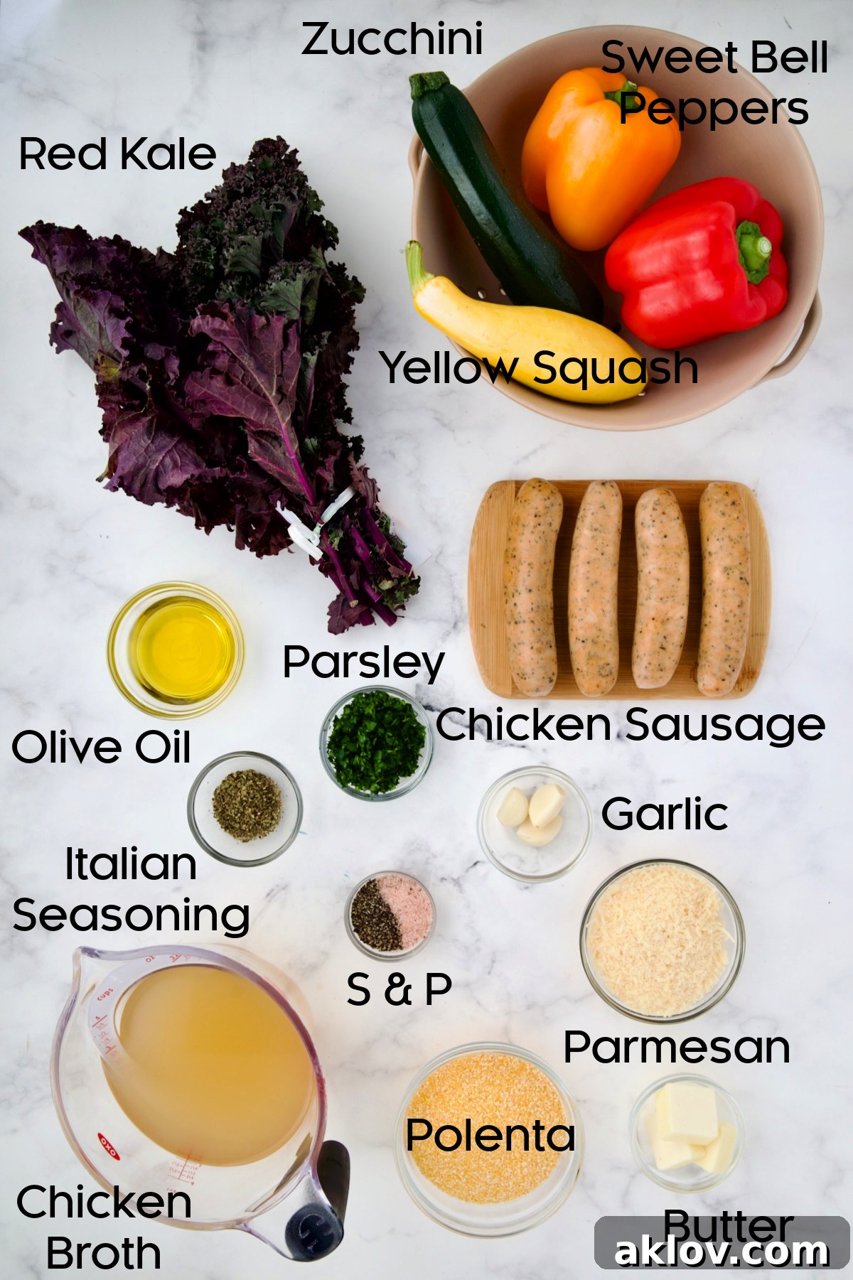 Ingredients for Chicken Sausage Sheet Pan and Polenta on white marble surface.