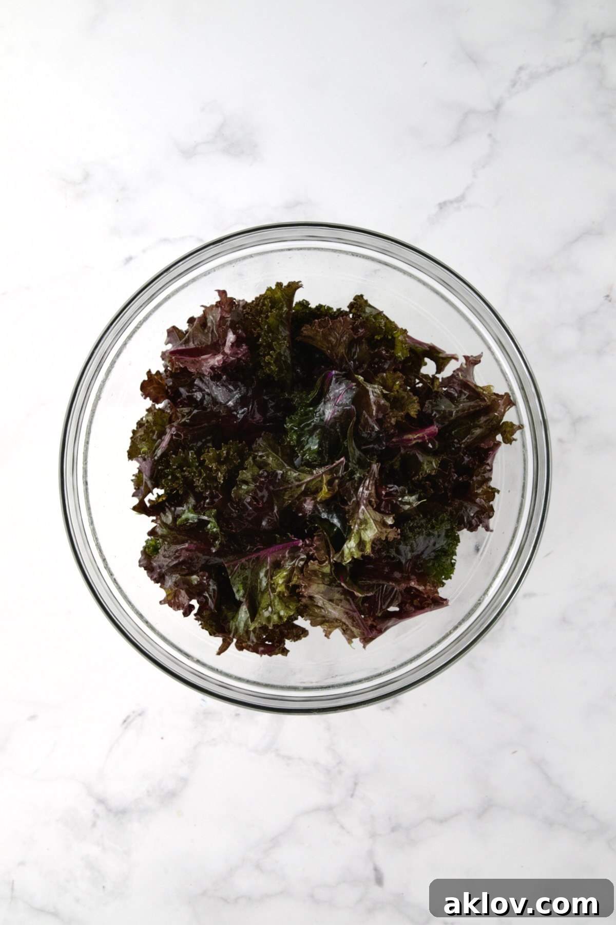 Wilted kale in glass bowl.