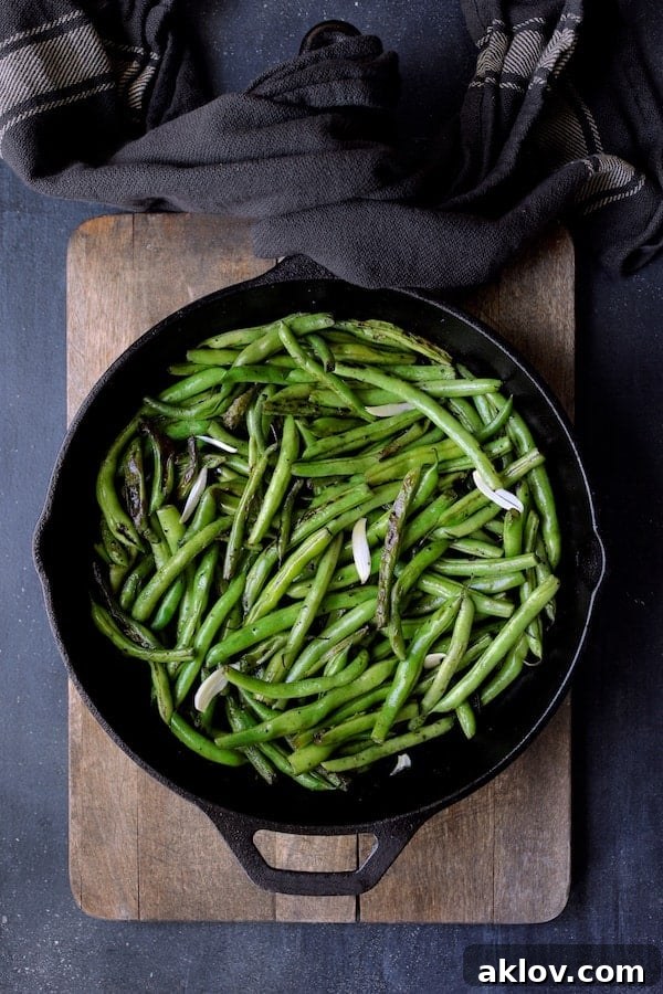 Photo of Skillet Charred Green Beans in cast iron skillet after charring.