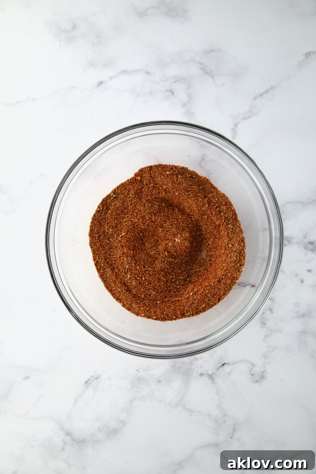 Blackening Seasoning ingredients in glass bowl after being mixed together.