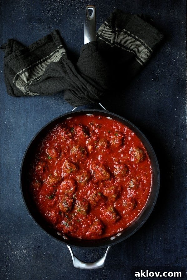 Photo of Middle Eastern Meatballs in Tomato Sauce in saucepan.
