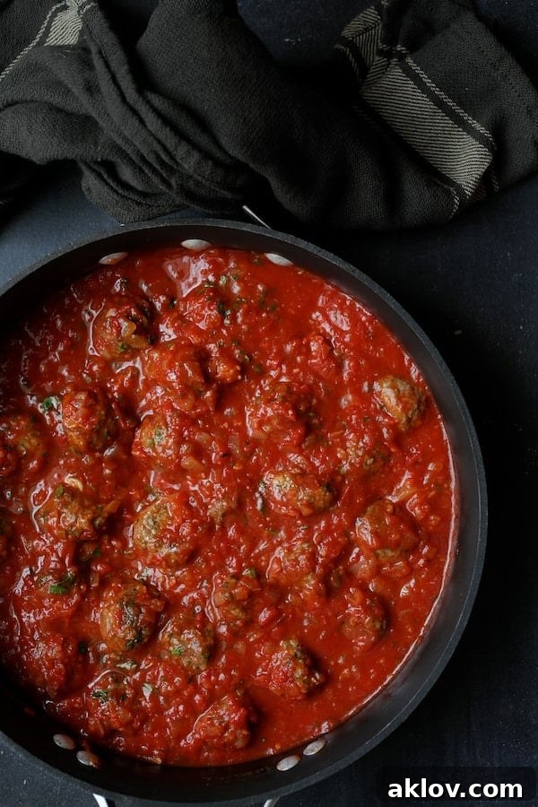Photo of Middle Eastern Meatballs in Tomato Sauce in saucepan.
