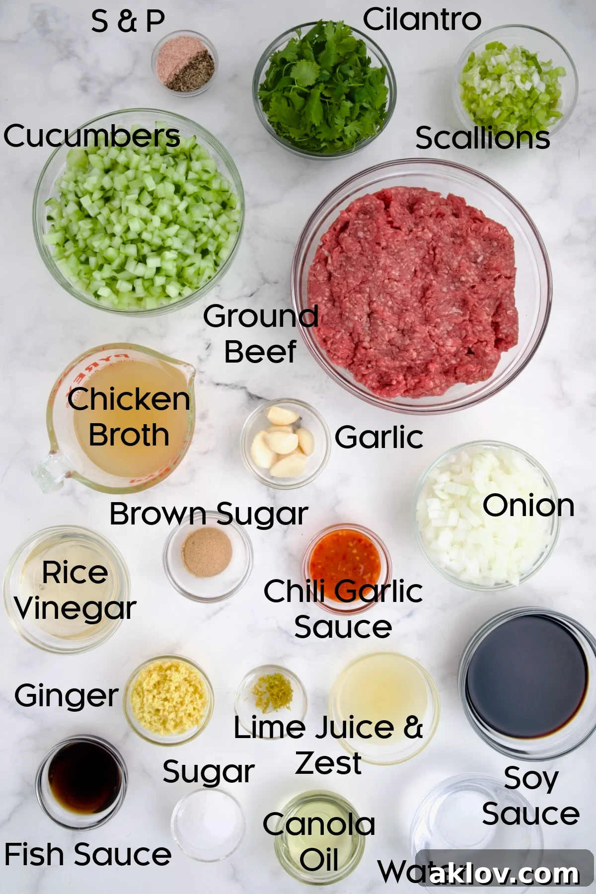 Ingredients for Vietnamese Beef Lettuce Wraps in glass bowls.
