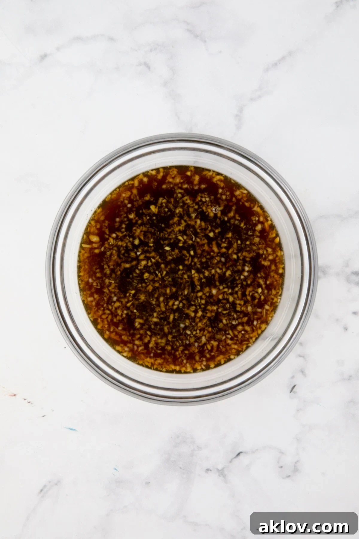 Dipping sauce in glass bowl.