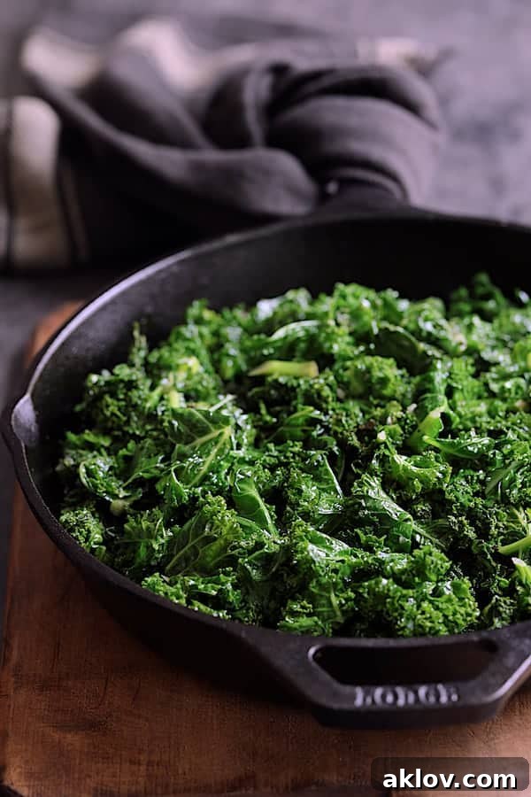 Shot of sauteed kale in cast iron skillet