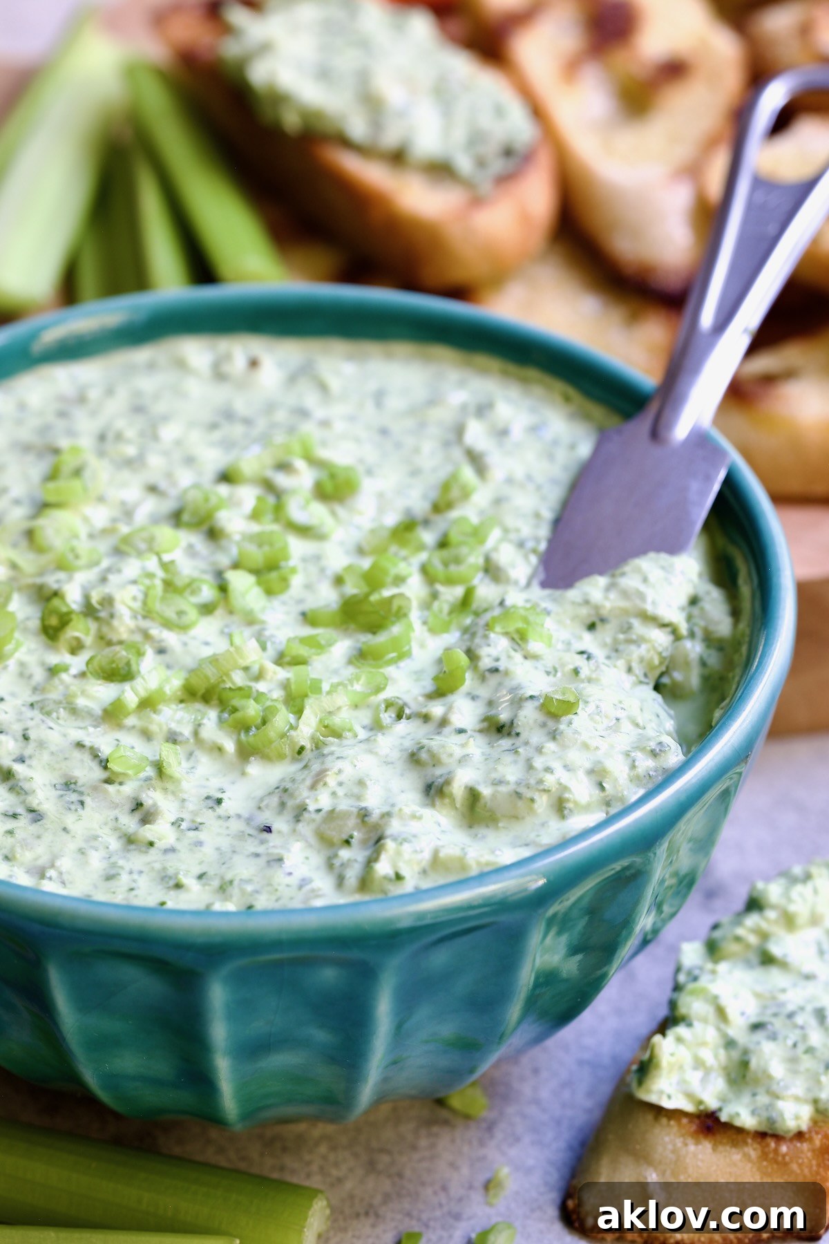 Spinach Artichoke Dip in Blue Bowl.