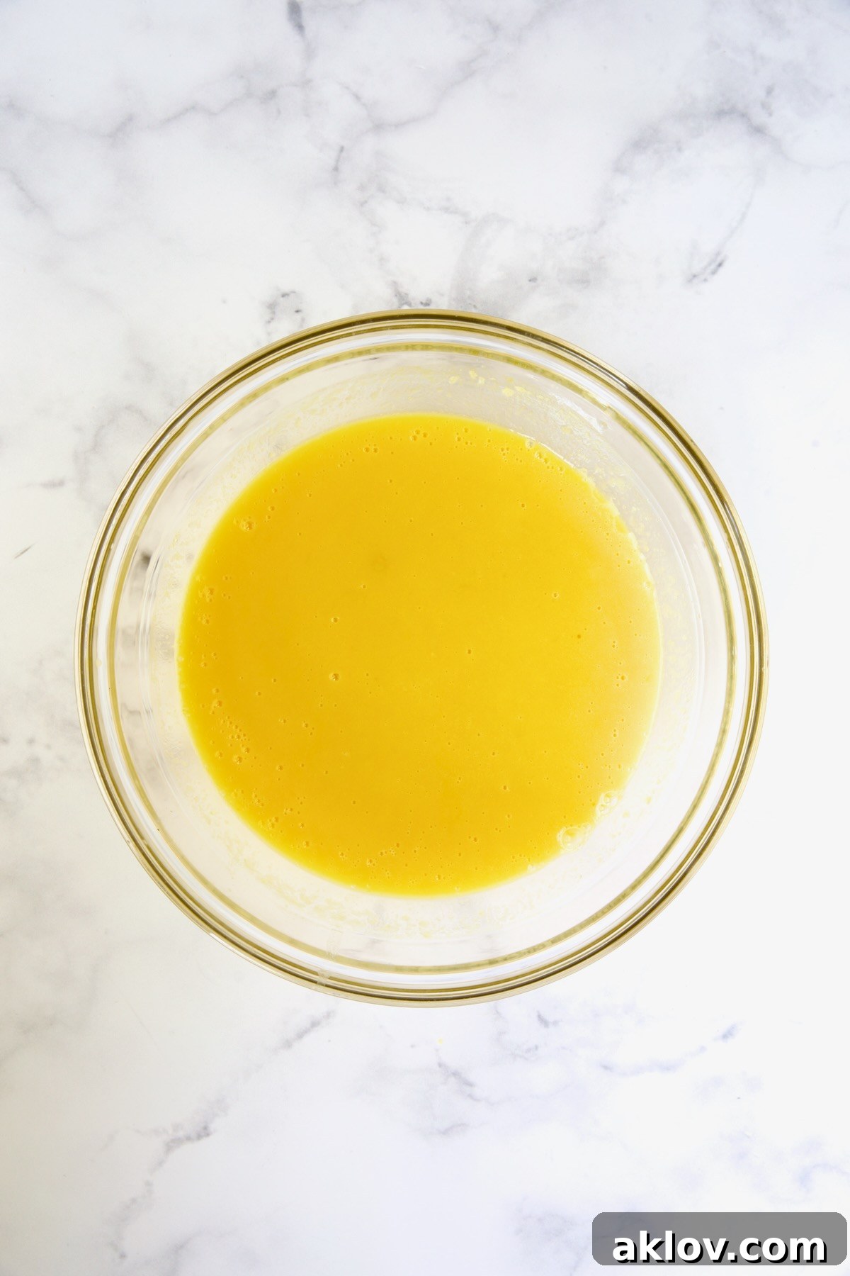 Mango puree in glass bowl.