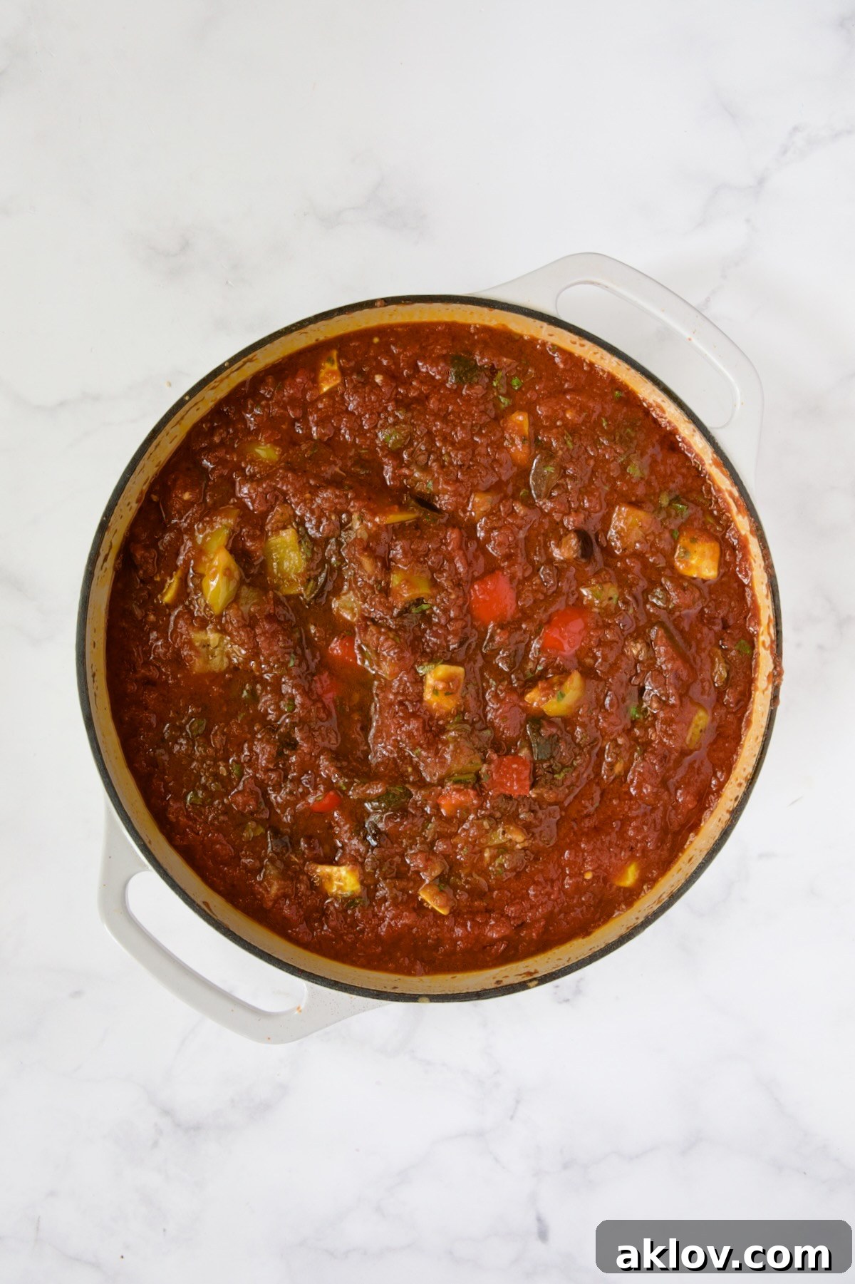Finished Veggie Pasta Sauce in white enamel cast iron skillet.