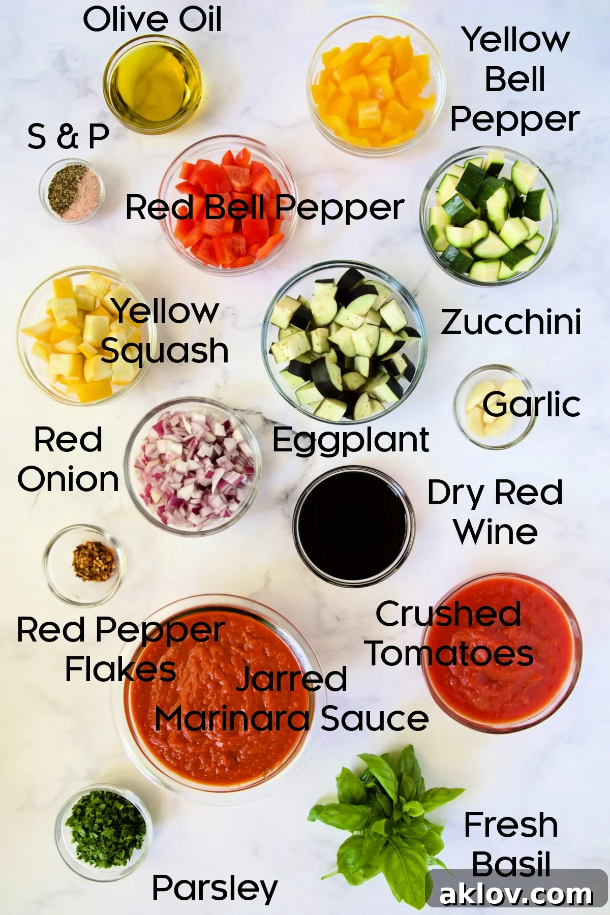 Prepped ingredients for Veggie Pasta Sauce in glass bowls.