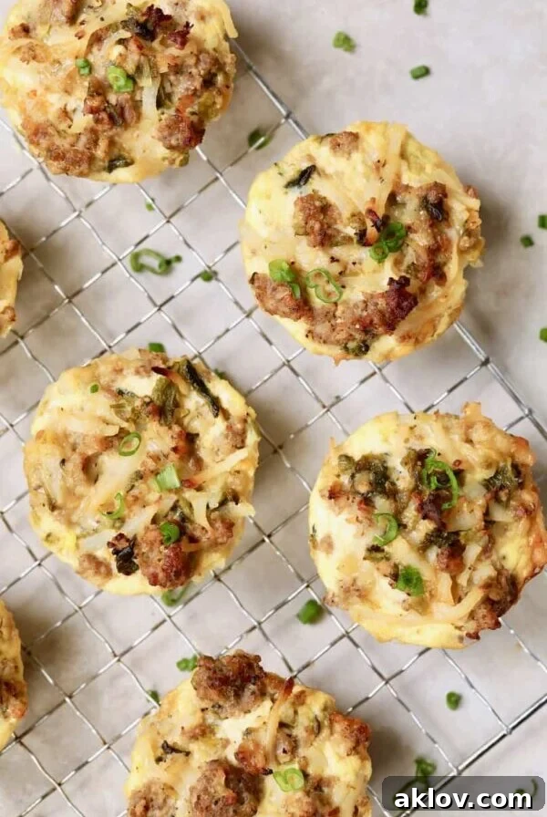 Hash Brown Breakfast Muffins with Poblano Peppers and Gouda Cheese - Overhead hero shot of muffins on cooling rack