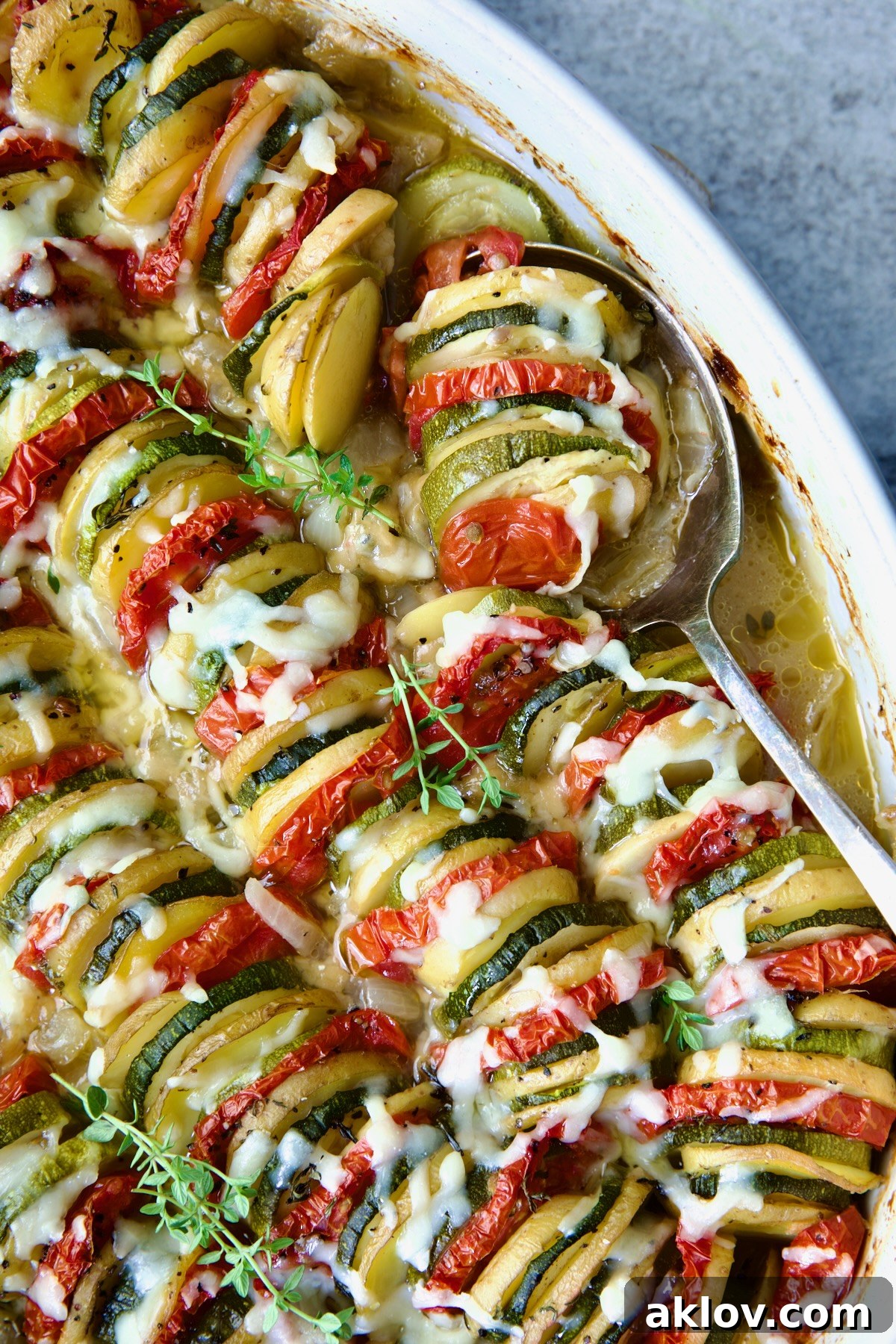 Vegetable Tian with serving spoon.