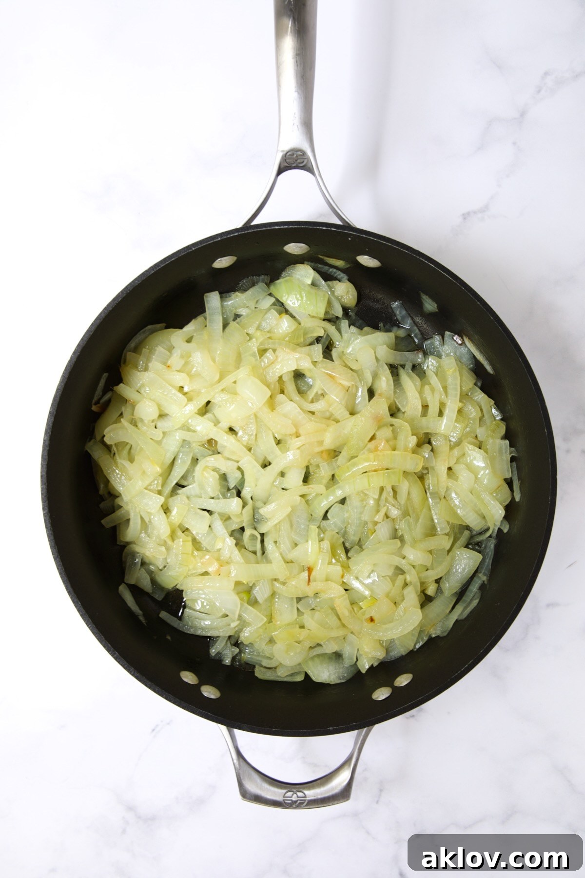 Cooked onions in nonstick skillet.