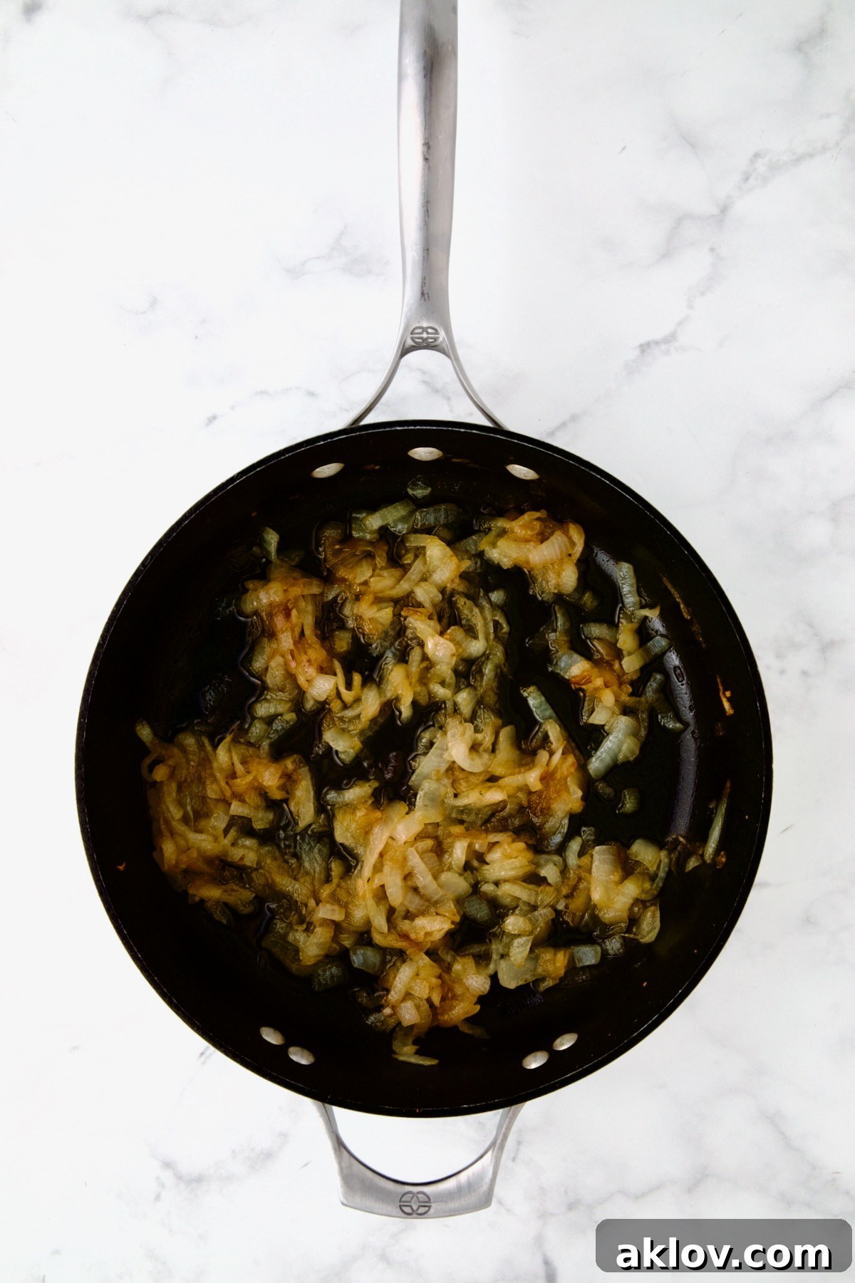 Golden Turkey Meatballs with Ale Glaze 12 Onions cooked to golden in nonstick skillet.