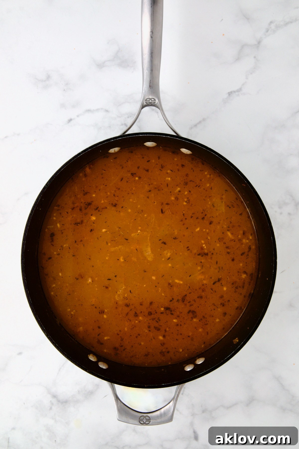 Golden Turkey Meatballs with Ale Glaze 15 Beer added to onions, tomato paste and flour in nonstick skillet.
