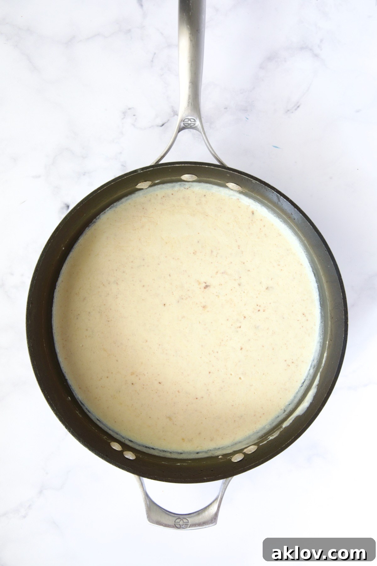 Creamy sauce in nonstick skillet.