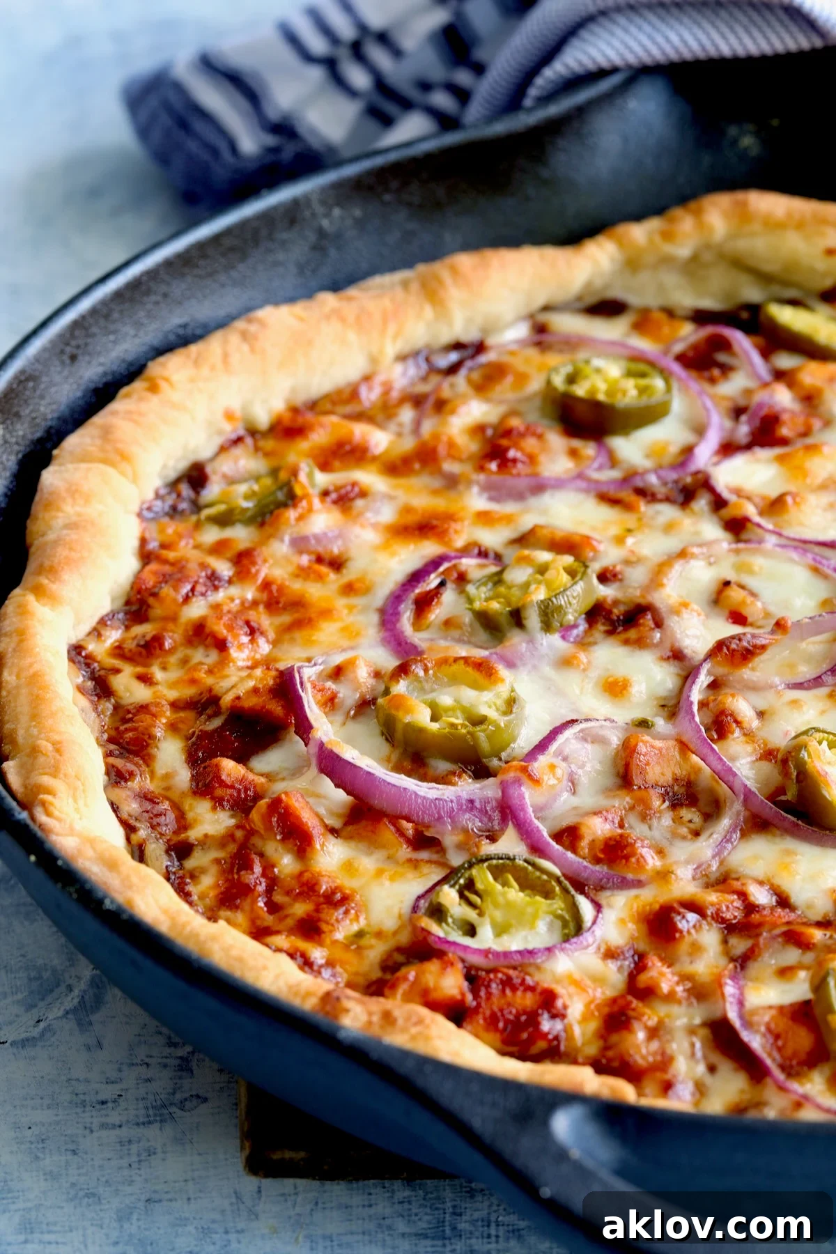 Another view of the freshly baked Cast Iron Skillet Pizza, showcasing its appealing texture and color.