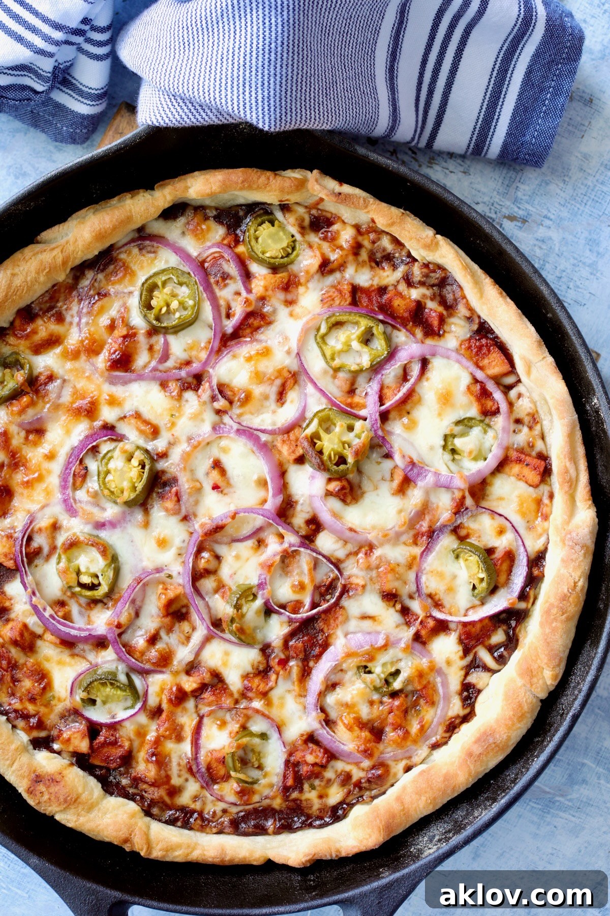Whole Cast Iron Skillet Pizza in black cast iron skillet.