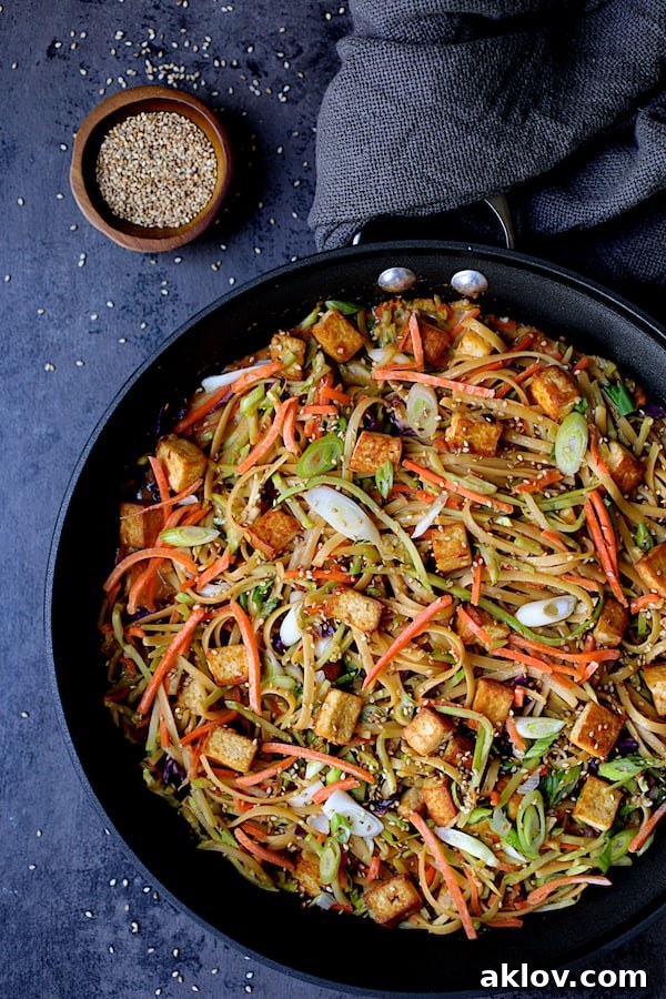 Thai Sesame Noodles with Tofu and Vegetables - Overhead shot of noodle dish in skillet