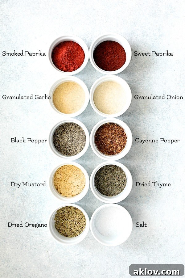 Overhead shot of individual ingredients for the blackening mix displayed in white ramekins.