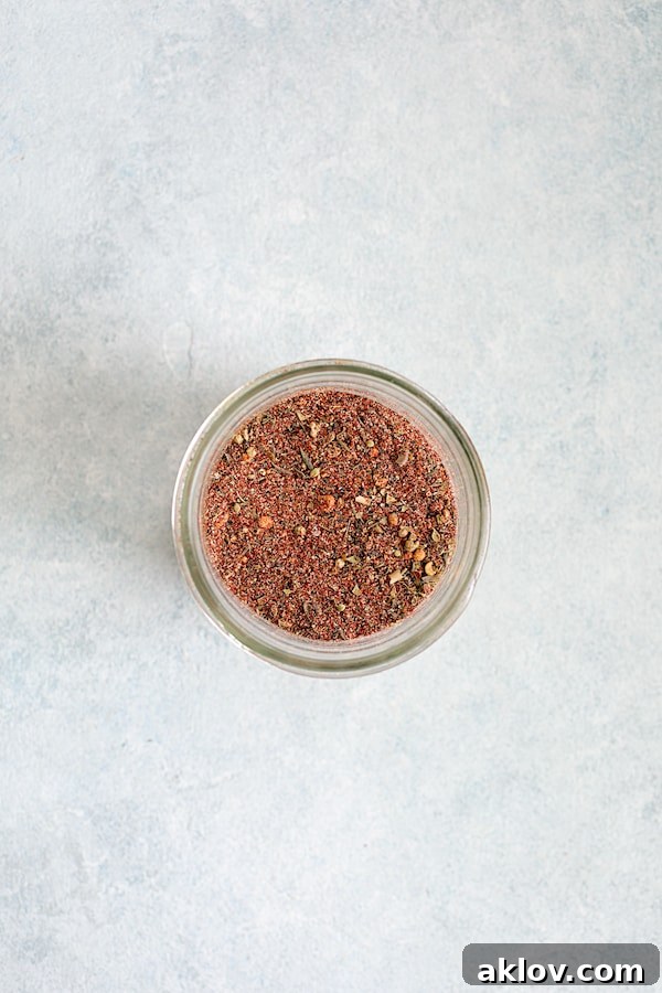 Overhead shot of a jar containing the combined blackening mix, ready for storage and future use.