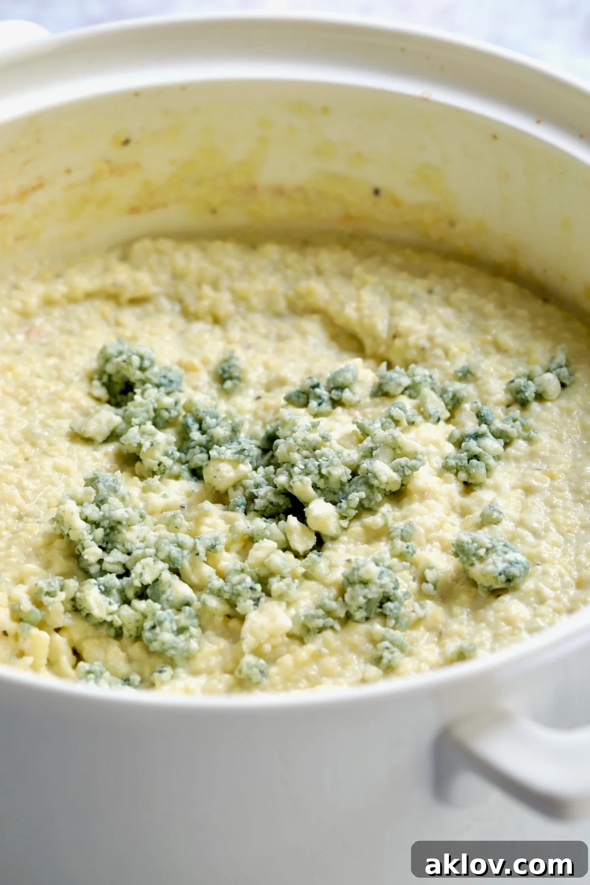 Gorgonzola Polenta in white ceramic baking dish.