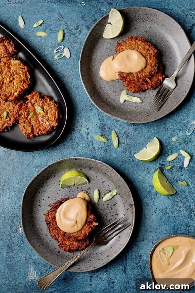Crispy Sweet Potato Latkes with Fiery Gochujang Aioli 10 Photo of Korean Sweet Potato Latkes with Gochujang Mayonnaise on gray plates.