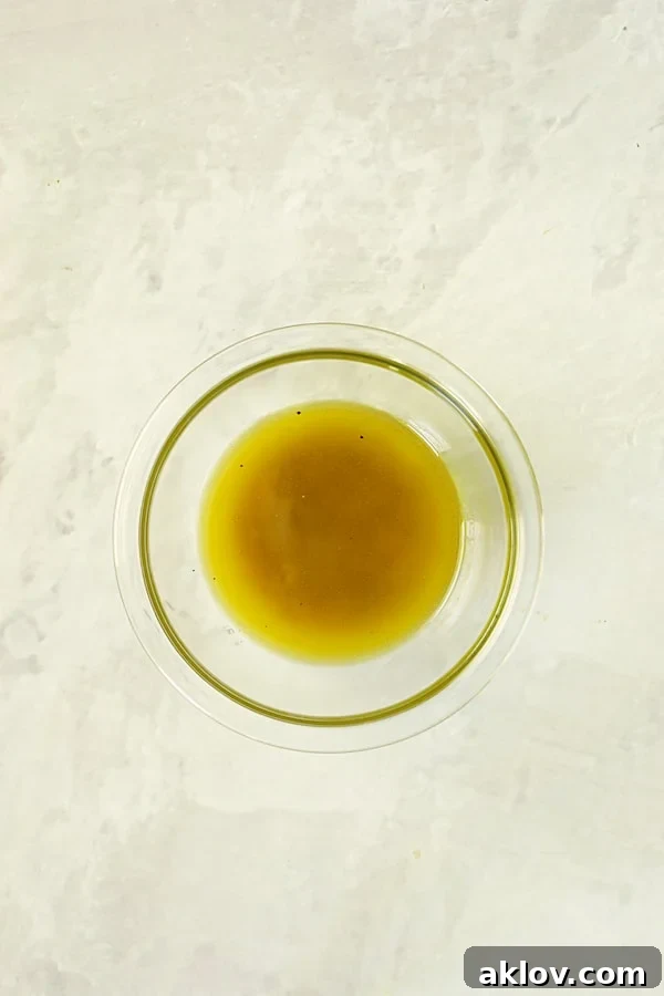 Photo of vinaigrette in glass bowl.