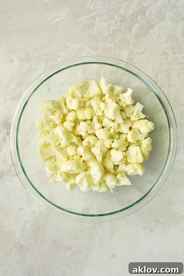 Photo of blanched cauliflower in glass bowl.
