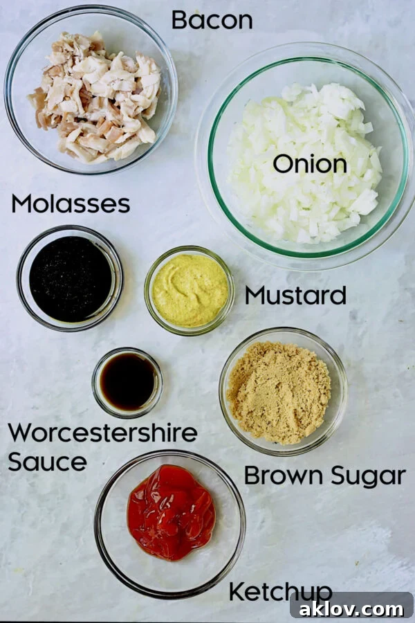 Ingredients for Kicked-Up Canned Baked Beans in glass bowls.