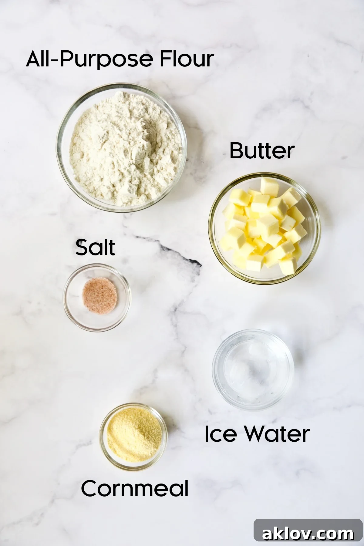 Ingredients for galette dough in glass bowls.
