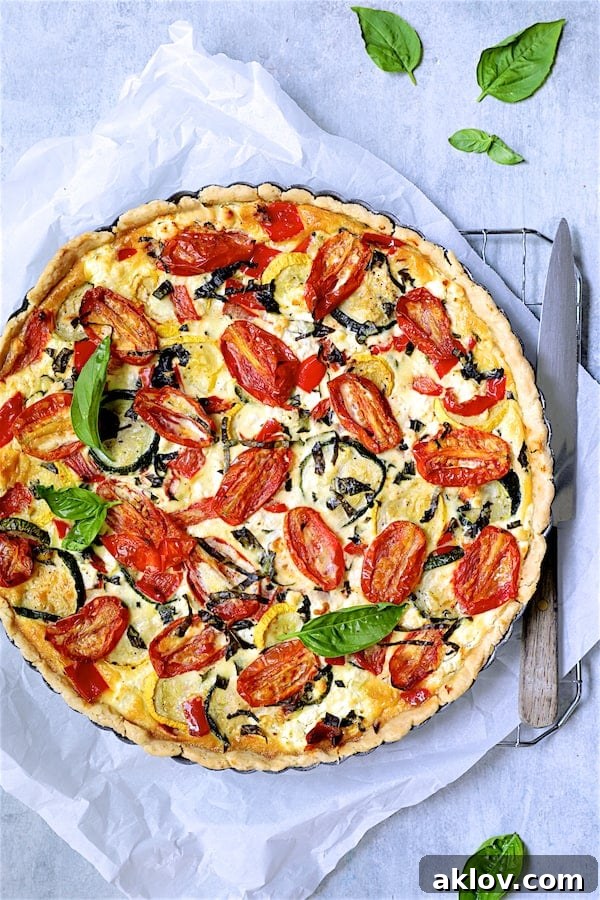 Photo of whole Provencal Vegetable and Goat Cheese Tart on cooling rack.