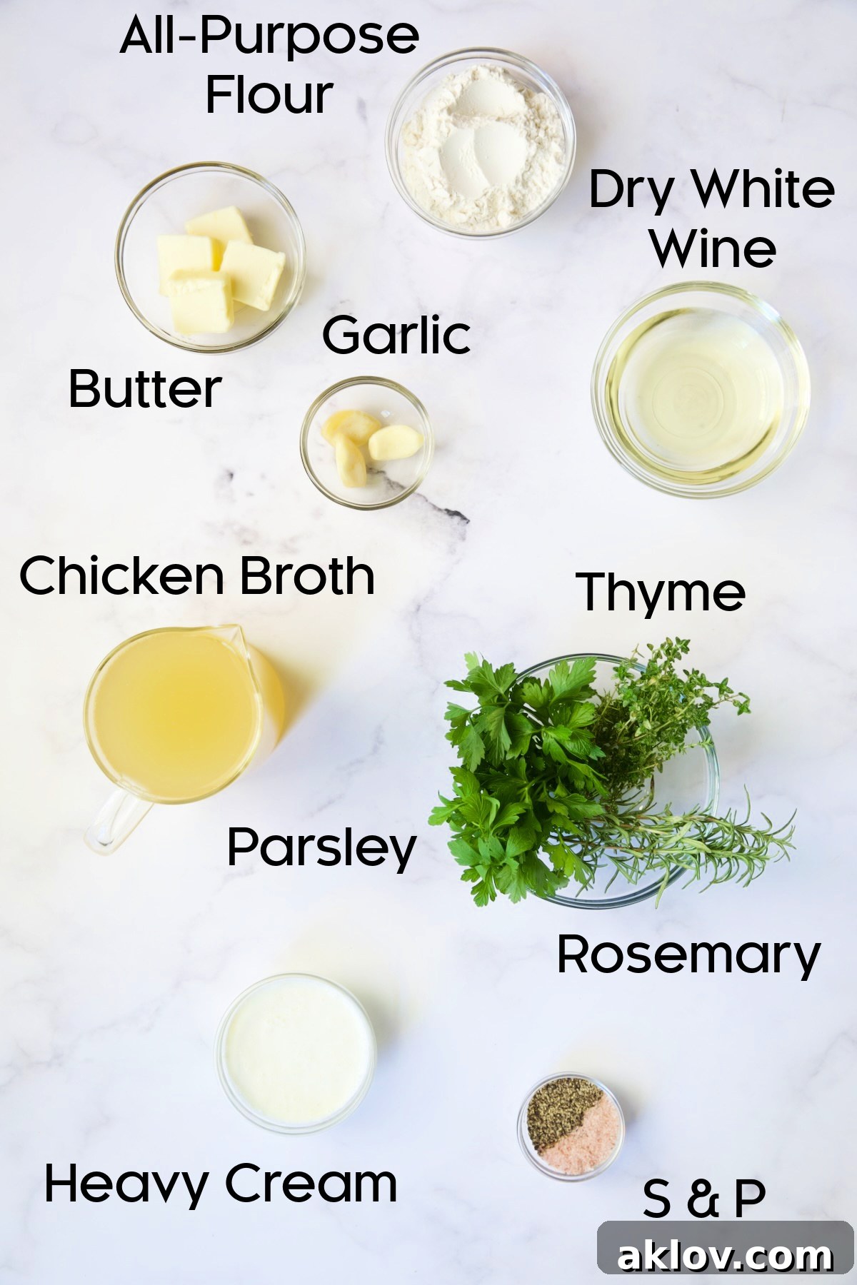 Prepared ingredients for the creamy Garlic Herb Sauce, displayed in glass bowls.