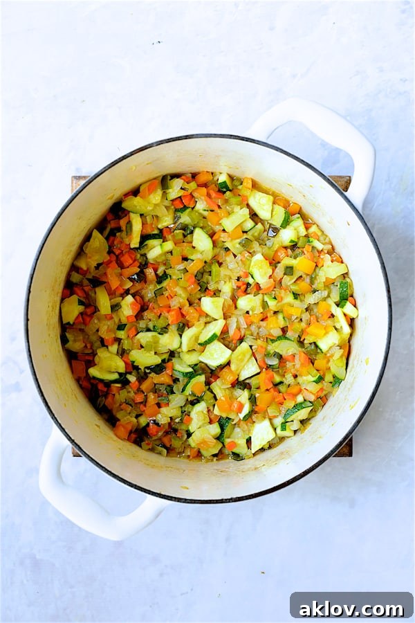 Rustic Chorizo, White Bean and Vegetable Stew 6 A medley of chopped vegetables gently cooking in the same white Dutch oven, absorbing flavors from the browned chorizo remnants.