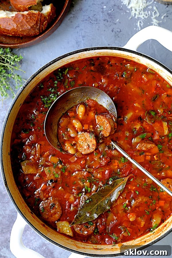 Rustic Chorizo, White Bean and Vegetable Stew 8 The Chorizo White Bean and Vegetable Soup simmering gently in a white Dutch oven, rich with color and aroma.